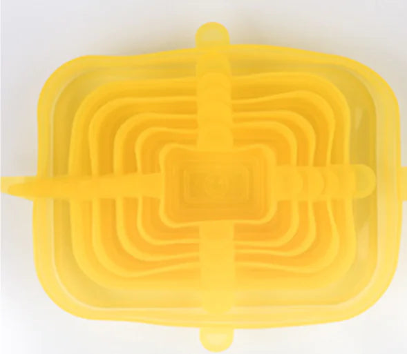 Stretch lids on various containers