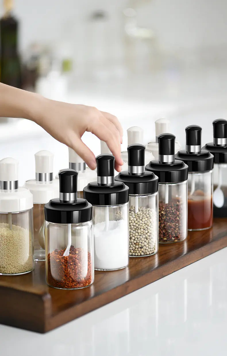 Glass spice jar with spoon heads